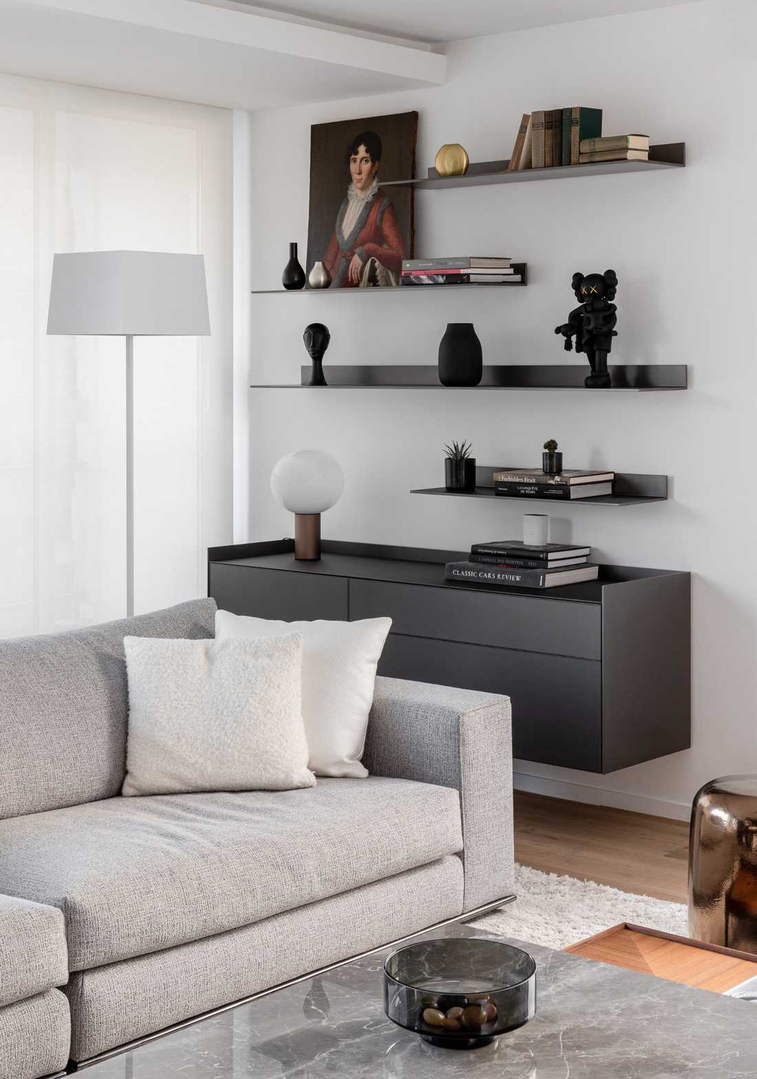 Canapé Minotti dans le salon d'un appartement rénové par un architecte d'intérieur en Ile de France