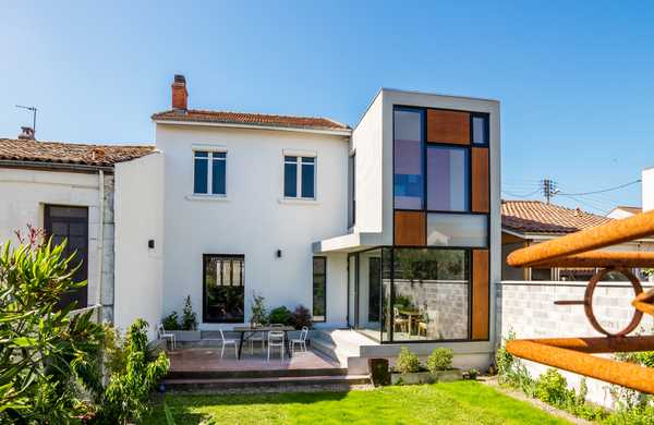 Conception et réalisation d'une extension dans une maison de ville par un architecte à Paris