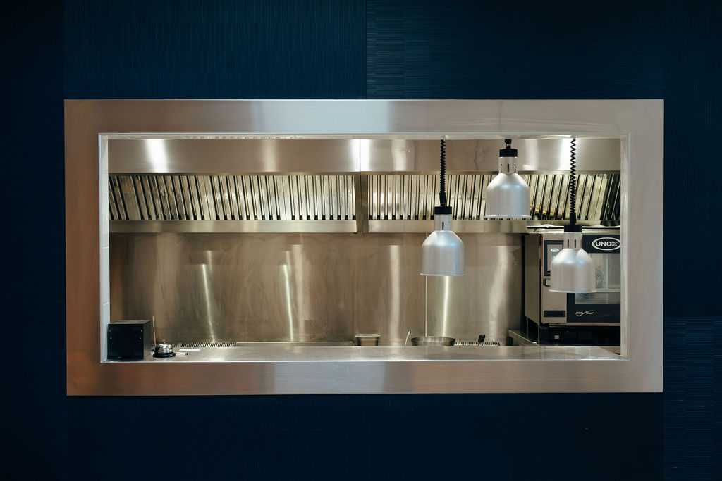 Ouverture de la cuisine sur la salle de restaurant pour optimiser les flux